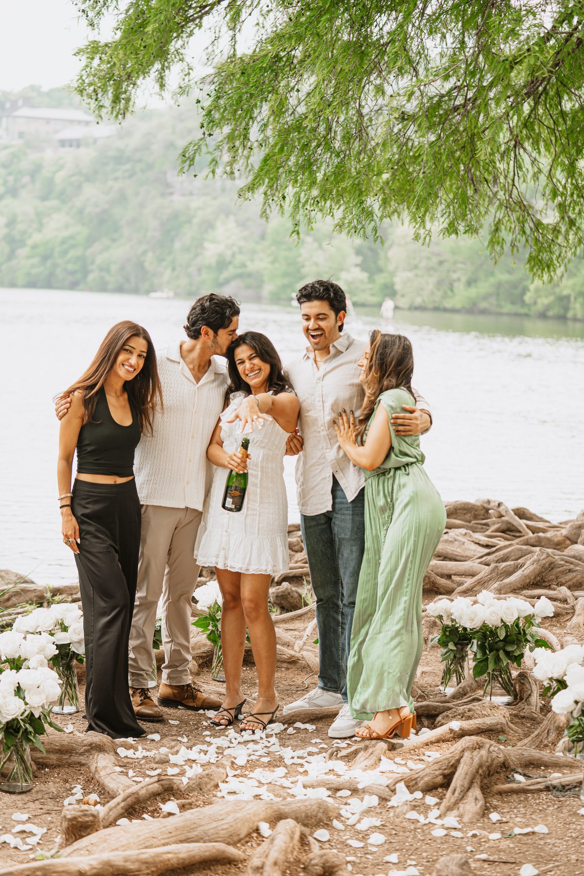 The proposal, surrounded by friends